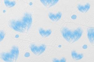 Abstract blue heart isolated on white leather or paper texture,valentine day and love concept. photo