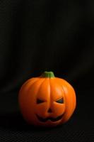 The halloween pumpkin jack in black holiday background image. photo