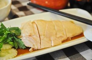 Delicate aromatic Hainanese chicken rice photo