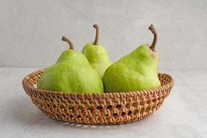 Fresh and healthy green pear fruits, close up photo