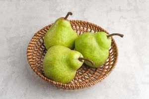 Fresh and healthy green pear fruits, close up photo