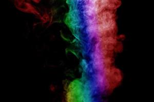 Abstract smoke isolated on black background,Rainbow powder photo