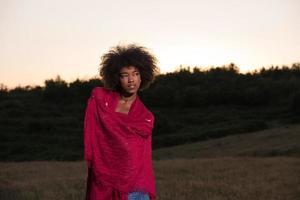 outdoor portrait of a black woman with a scarf photo