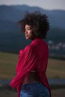 outdoor portrait of a black woman with a scarf photo