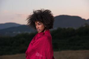 outdoor portrait of a black woman with a scarf photo