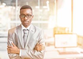 Young businessman in his office photo