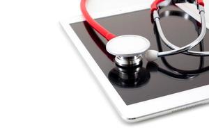 Stethoscope on with computer tablet ,technology healthcare concept photo