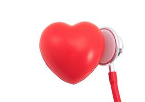 Stethoscope and red heart on white background photo