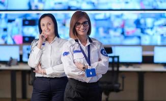 group portrait of Female operator in a security data system control room photo