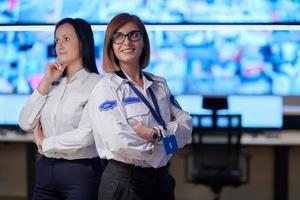 group portrait of Female operator in a security data system control room photo