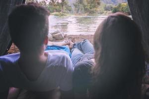 couple spending time together in straw tent photo