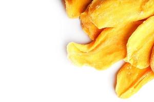 Dried mango sliced on a white background with free space photo