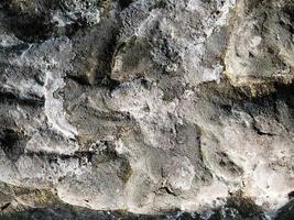 Stone blocks of an ancient building close-up photo