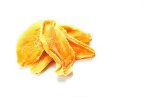 Dried mango sliced on a white background with free space photo