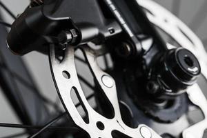 Bicycle brake rotor with hydraulic caliper. Brake system on a gravel bike photo