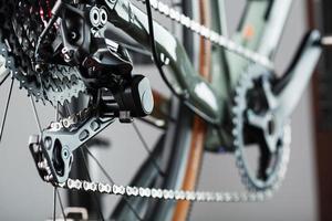 Rear bicycle cassette speeds with a wide range and chain close-up photo