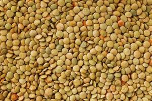 Lentils. Lentils background. Green lentils pattern. Natural organic lentils for healthy food photo