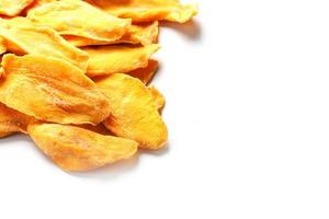 Dried mango sliced on a white background with free space photo