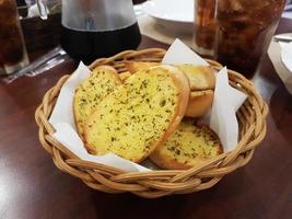 Garlic bread in basket photo