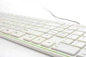 Close up of white keyboard on white background photo