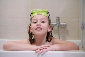 little girl with snorkel goggles photo