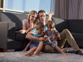 Family in livingroom photo