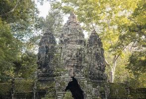 The Bayon gate of Angkor Thom the ancient Khmer empire in Siem Reap, Cambodia. photo