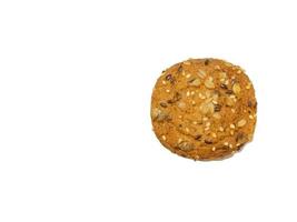 Oatmeal cookies with cereals and nuts on a white background. View from above. photo