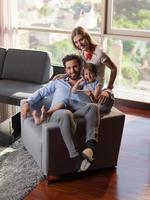 Family in livingroom photo