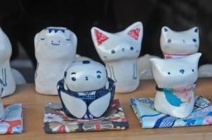 Ceramic traditional Japanese samurai pig cat kappa dolls photo