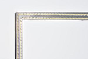 Strip LED lamp lighting with square aluminum profile on suspended ceiling in house, fragment, close photo