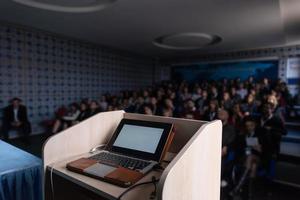 laptop computer at podium photo