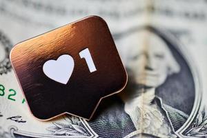 Like heart symbol on dollar photo