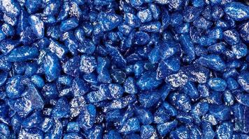 Blue glitter stones for garden decoration photo