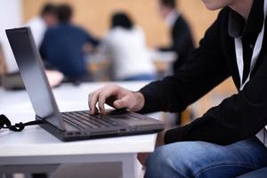 business people hands using laptop computer photo