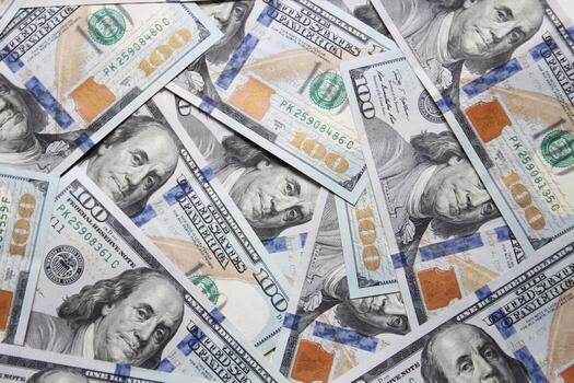 100 dollar US banknotes placed on a white background. photo