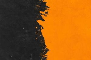 black and orange brush texture background.Abstract brushstroke background, flat shapes .on a concrete wall photo