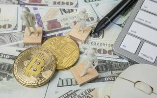 The bitcoins and white figure for crypto currency content photo