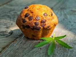 hash butter cupcake cannabis leaf, sweet marijuana food photo