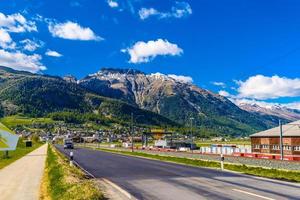 Road with Alps mountains, Samedan, Maloja, Graubuenden, Switzerl photo