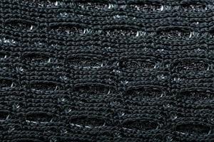 Mesh of black sports sneakers for training Macro photo