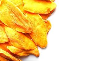 Dried mango sliced on a white background with free space photo