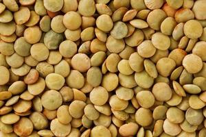 Lentils. Lentils background. Green lentils pattern. Natural organic lentils for healthy food photo