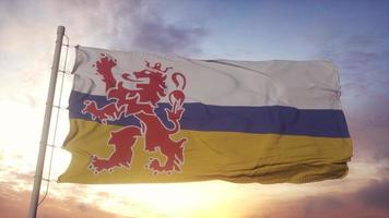 Limburg flag, Netherlands, waving in the wind, sky and sun background. 3d illustration photo