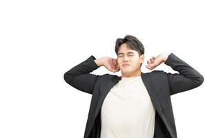 asian businessman wear formal suit feeling bore and body pain by office syndrome. isolated on white background. photo