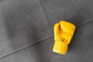 yellow boxing gloves in Gym Fitness. photo