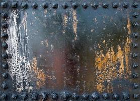 rusty metal with tar photo