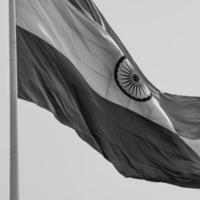 India flag flying at Connaught Place with pride in blue sky, India flag fluttering, Indian Flag on Independence Day and Republic Day of India, waving Indian flag, Flying India flags - Black and White photo