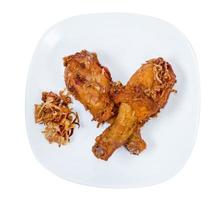 Fried Chicken Drumstick on white dish,isolated on white background,clipping path photo