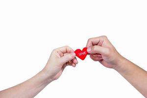 hand holding heart-shaped isolated over white,clipping path photo